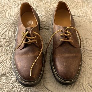 Dr Martens brown shoes.